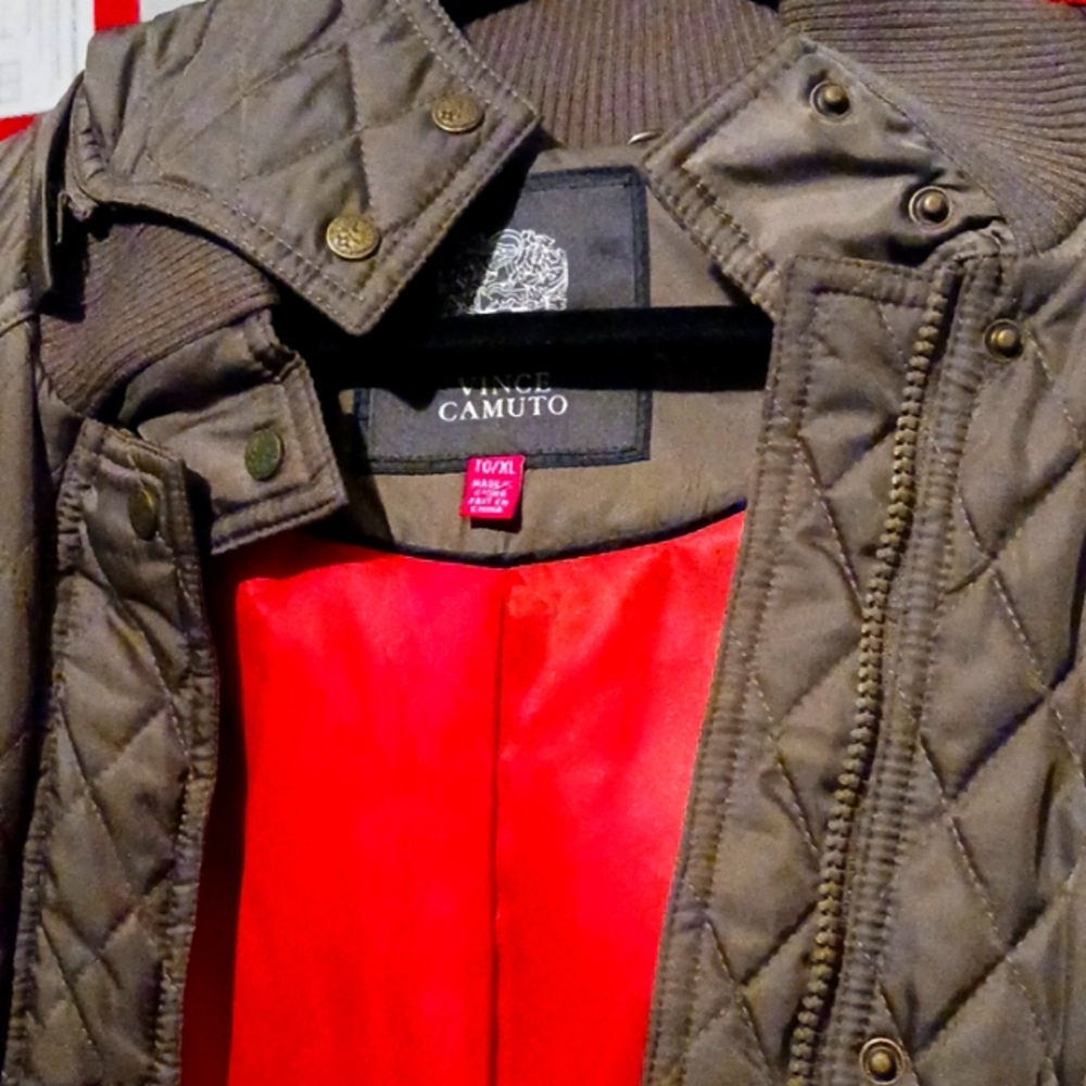 EUC Never worn jacket, red interior, olive green